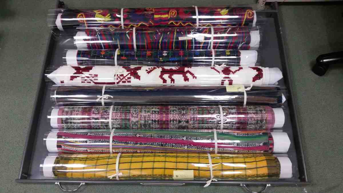 Skirts and other long fabrics were rolled