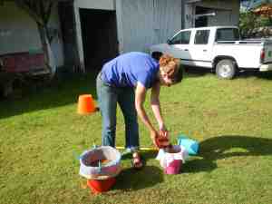 Me floating soils for botanical remains at the New World Archaeological Foundation, summer 2013